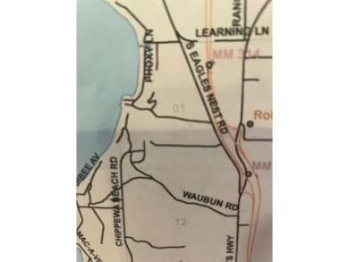 Nicely Wooded, Large Building Lot Located in a great location on Indian River Golf Club in Michigan - for sale on GolfHomes.com, golf home, golf lot