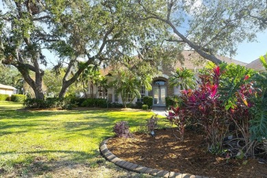 This Arthur Rutenberg built home is situated on a wooded double on River Wilderness Golf and Country Club in Florida - for sale on GolfHomes.com, golf home, golf lot