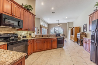 Experience SPECTACULAR SUNSETS & Golf Course Living from this on Lake Jovita Golf and Country Club in Florida - for sale on GolfHomes.com, golf home, golf lot