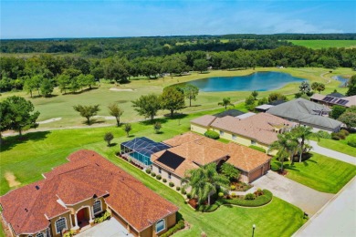 Experience SPECTACULAR SUNSETS & Golf Course Living from this on Lake Jovita Golf and Country Club in Florida - for sale on GolfHomes.com, golf home, golf lot