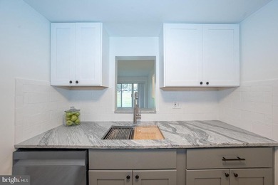 Just available! An exquisite, bright and cheery, one-bedroom on Glenhardie Country Club in Pennsylvania - for sale on GolfHomes.com, golf home, golf lot