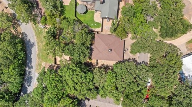 Here, nestled in a wooded wonderland, lies your next home away on Tanglewood Resort in Texas - for sale on GolfHomes.com, golf home, golf lot