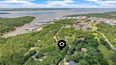 Here, nestled in a wooded wonderland, lies your next home away on Tanglewood Resort in Texas - for sale on GolfHomes.com, golf home, golf lot