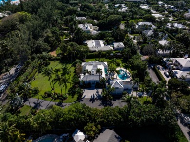 On a beautifully landscaped 1.26-acre lot, just across the on Gulf Stream Golf Club in Florida - for sale on GolfHomes.com, golf home, golf lot