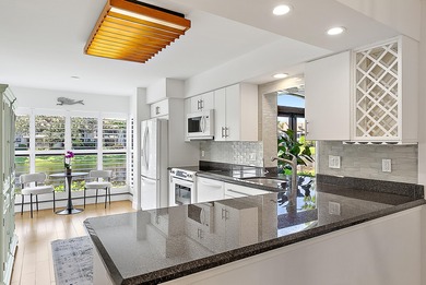 Enjoy serene lakefront views from this beautifully updated on Jonathans Landing Golf Club in Florida - for sale on GolfHomes.com, golf home, golf lot