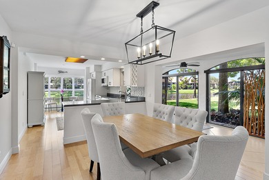 Enjoy serene lakefront views from this beautifully updated on Jonathans Landing Golf Club in Florida - for sale on GolfHomes.com, golf home, golf lot