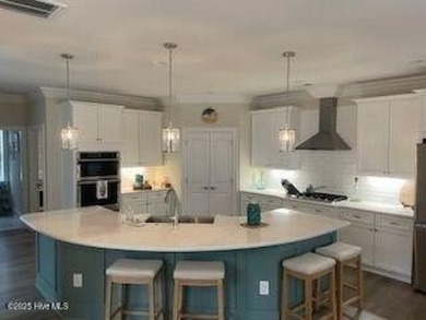 Experience luxury coastal living in this custom 4 bedroom-3 1/2 on Sea Trail Golf Resort in North Carolina - for sale on GolfHomes.com, golf home, golf lot