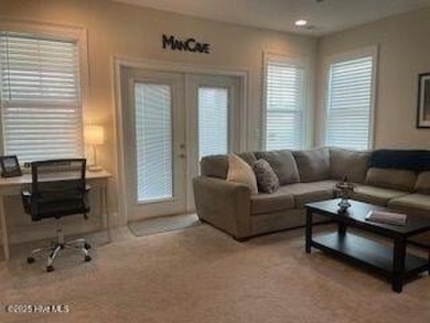 Experience luxury coastal living in this custom 4 bedroom-3 1/2 on Sea Trail Golf Resort in North Carolina - for sale on GolfHomes.com, golf home, golf lot