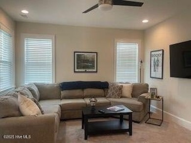 Experience luxury coastal living in this custom 4 bedroom-3 1/2 on Sea Trail Golf Resort in North Carolina - for sale on GolfHomes.com, golf home, golf lot