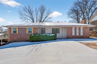 Welcome home to this well-maintained three bedroom, two bath on Cedars Country Club in Arkansas - for sale on GolfHomes.com, golf home, golf lot