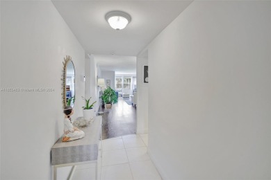 Perfect meticulously maintained 2-bedroom 2-bath corner unit on Sunrise Lakes Phase III in Florida - for sale on GolfHomes.com, golf home, golf lot