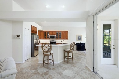 Nestled on a private homesite at the end of a quiet cul-de-sac on University Park Country Club in Florida - for sale on GolfHomes.com, golf home, golf lot