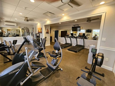 This 1500'+ 2 Bdrm + office/den is priced to sell--$80's. Open on Southport Springs Golf Club in Florida - for sale on GolfHomes.com, golf home, golf lot