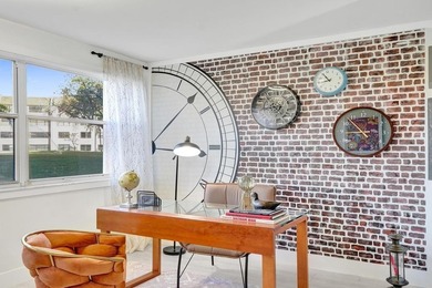 Stunning fully remodeled 1,370 SF first-floor residence blending on Sunrise Lakes Phase IV Golf Course in Florida - for sale on GolfHomes.com, golf home, golf lot