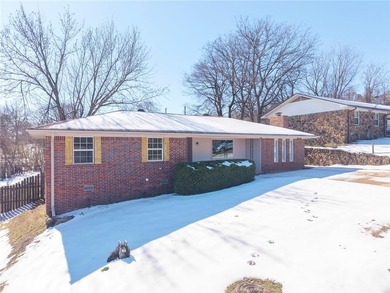 Welcome home to this well-maintained three bedroom, two bath on Cedars Country Club in Arkansas - for sale on GolfHomes.com, golf home, golf lot