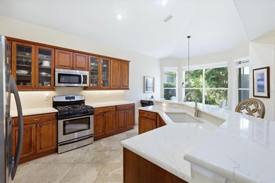 Nestled on a private homesite at the end of a quiet cul-de-sac on University Park Country Club in Florida - for sale on GolfHomes.com, golf home, golf lot