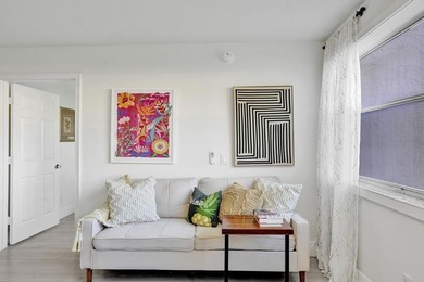 Stunning fully remodeled 1,370 SF first-floor residence blending on Sunrise Lakes Phase IV Golf Course in Florida - for sale on GolfHomes.com, golf home, golf lot