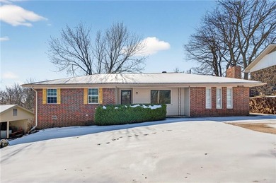 Welcome home to this well-maintained three bedroom, two bath on Cedars Country Club in Arkansas - for sale on GolfHomes.com, golf home, golf lot
