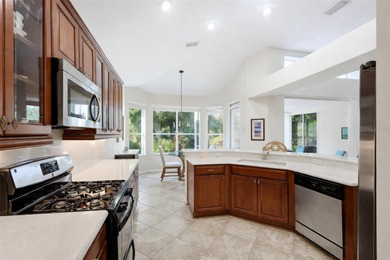 Nestled on a private homesite at the end of a quiet cul-de-sac on University Park Country Club in Florida - for sale on GolfHomes.com, golf home, golf lot