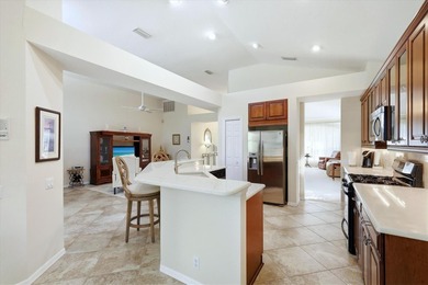 Nestled on a private homesite at the end of a quiet cul-de-sac on University Park Country Club in Florida - for sale on GolfHomes.com, golf home, golf lot