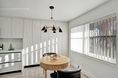 Stunning fully remodeled 1,370 SF first-floor residence blending on Sunrise Lakes Phase IV Golf Course in Florida - for sale on GolfHomes.com, golf home, golf lot