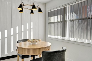 Stunning fully remodeled 1,370 SF first-floor residence blending on Sunrise Lakes Phase IV Golf Course in Florida - for sale on GolfHomes.com, golf home, golf lot