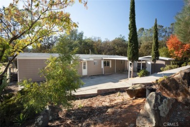 Cute, clean and affordable manufactured home that backs up to on Lake Oroville Golf and Event Center in California - for sale on GolfHomes.com, golf home, golf lot