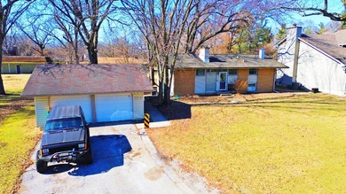 4 bedroom reverse bi-level home situated on almost a HALF ACRE on Innsbrook Country Club in Indiana - for sale on GolfHomes.com, golf home, golf lot