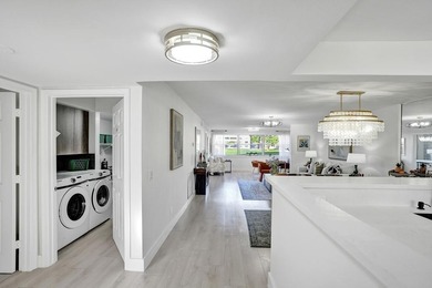 Stunning fully remodeled 1,370 SF first-floor residence blending on Sunrise Lakes Phase IV Golf Course in Florida - for sale on GolfHomes.com, golf home, golf lot