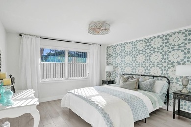 Stunning fully remodeled 1,370 SF first-floor residence blending on Sunrise Lakes Phase IV Golf Course in Florida - for sale on GolfHomes.com, golf home, golf lot