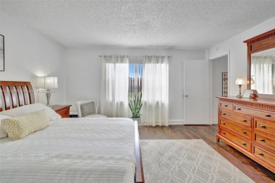 Perfect meticulously maintained 2-bedroom 2-bath corner unit on Sunrise Lakes Phase III in Florida - for sale on GolfHomes.com, golf home, golf lot