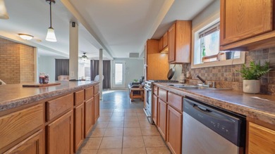 4 bedroom reverse bi-level home situated on almost a HALF ACRE on Innsbrook Country Club in Indiana - for sale on GolfHomes.com, golf home, golf lot