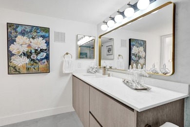 Stunning fully remodeled 1,370 SF first-floor residence blending on Sunrise Lakes Phase IV Golf Course in Florida - for sale on GolfHomes.com, golf home, golf lot