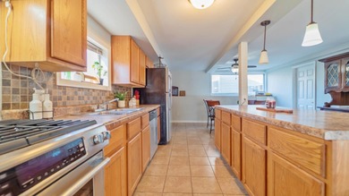 4 bedroom reverse bi-level home situated on almost a HALF ACRE on Innsbrook Country Club in Indiana - for sale on GolfHomes.com, golf home, golf lot