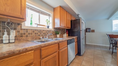 4 bedroom reverse bi-level home situated on almost a HALF ACRE on Innsbrook Country Club in Indiana - for sale on GolfHomes.com, golf home, golf lot