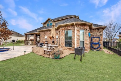 Step right off the 9th hole into your backyard for a barbecue! on The Golf Club at Resort Eagle Mountain Lake in Texas - for sale on GolfHomes.com, golf home, golf lot