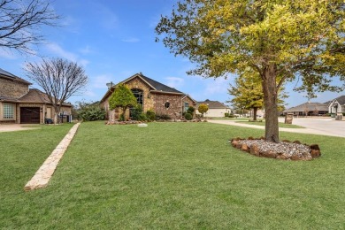 Step right off the 9th hole into your backyard for a barbecue! on The Golf Club at Resort Eagle Mountain Lake in Texas - for sale on GolfHomes.com, golf home, golf lot