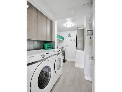 Stunning fully remodeled 1,370 SF first-floor residence blending on Sunrise Lakes Phase IV Golf Course in Florida - for sale on GolfHomes.com, golf home, golf lot