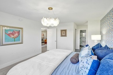 Stunning fully remodeled 1,370 SF first-floor residence blending on Sunrise Lakes Phase IV Golf Course in Florida - for sale on GolfHomes.com, golf home, golf lot