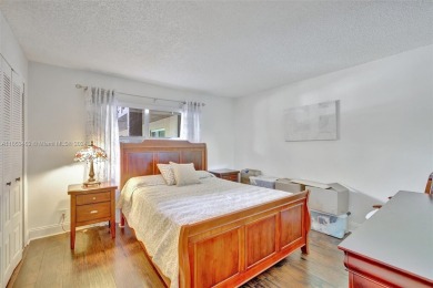 Perfect meticulously maintained 2-bedroom 2-bath corner unit on Sunrise Lakes Phase III in Florida - for sale on GolfHomes.com, golf home, golf lot