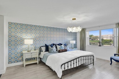 Stunning fully remodeled 1,370 SF first-floor residence blending on Sunrise Lakes Phase IV Golf Course in Florida - for sale on GolfHomes.com, golf home, golf lot