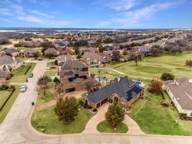 Step right off the 9th hole into your backyard for a barbecue! on The Golf Club at Resort Eagle Mountain Lake in Texas - for sale on GolfHomes.com, golf home, golf lot