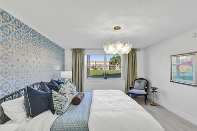 Stunning fully remodeled 1,370 SF first-floor residence blending on Sunrise Lakes Phase IV Golf Course in Florida - for sale on GolfHomes.com, golf home, golf lot