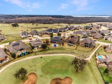 Step right off the 9th hole into your backyard for a barbecue! on The Golf Club at Resort Eagle Mountain Lake in Texas - for sale on GolfHomes.com, golf home, golf lot
