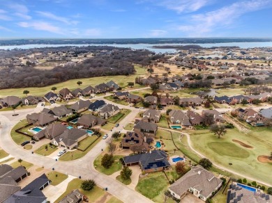 Step right off the 9th hole into your backyard for a barbecue! on The Golf Club at Resort Eagle Mountain Lake in Texas - for sale on GolfHomes.com, golf home, golf lot