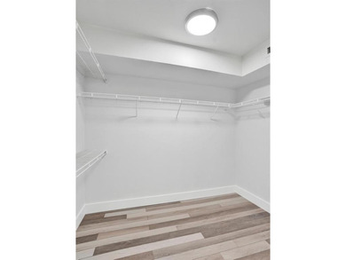 Stunning fully remodeled 1,370 SF first-floor residence blending on Sunrise Lakes Phase IV Golf Course in Florida - for sale on GolfHomes.com, golf home, golf lot