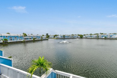 Nestled in the private and quiet community of The Villas of on The Club At Admirals Cove Golf Village in Florida - for sale on GolfHomes.com, golf home, golf lot