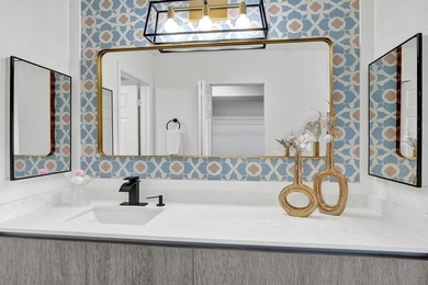 Stunning fully remodeled 1,370 SF first-floor residence blending on Sunrise Lakes Phase IV Golf Course in Florida - for sale on GolfHomes.com, golf home, golf lot