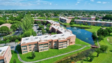Perfect meticulously maintained 2-bedroom 2-bath corner unit on Sunrise Lakes Phase III in Florida - for sale on GolfHomes.com, golf home, golf lot