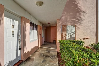 Stunning fully remodeled 1,370 SF first-floor residence blending on Sunrise Lakes Phase IV Golf Course in Florida - for sale on GolfHomes.com, golf home, golf lot